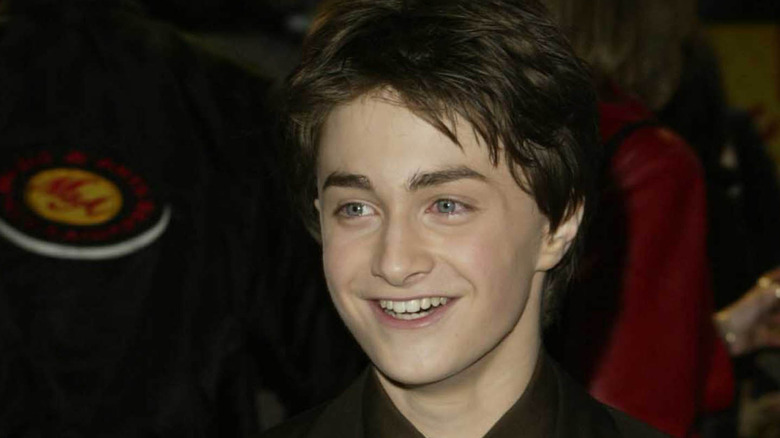 Daniel Radcliffe in a dark suit in 2002.