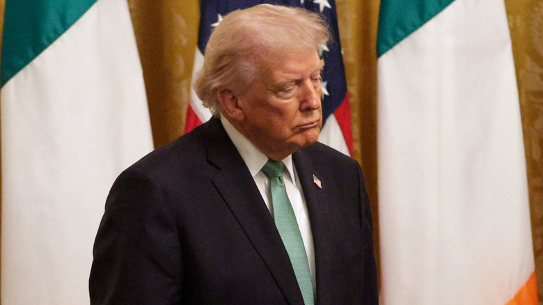 Donald Trump puckering his chin during a meeting with the Prime Minister of Ireland.
