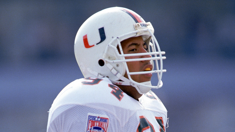 Dwayne Johnson playing football