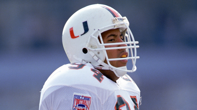Dwayne Johnson playing football