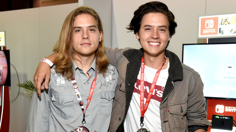 Dylan and Cole Sprouse smiling