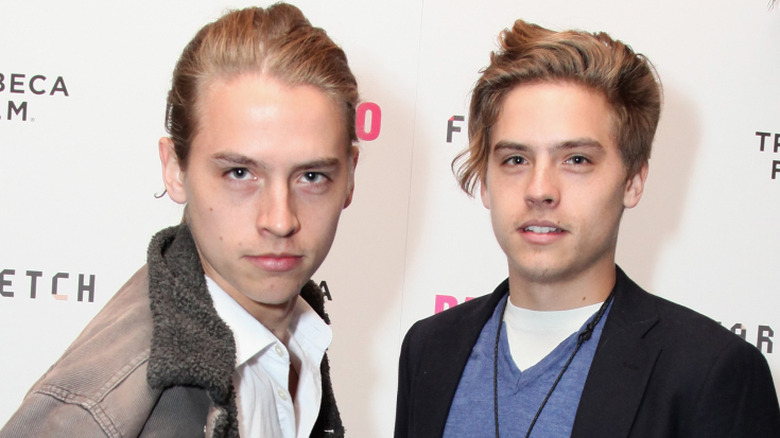 Dylan and Cole Sprouse looking at camera