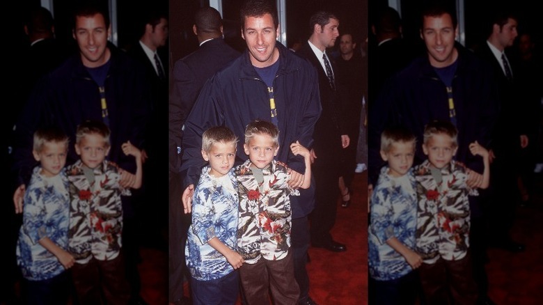 Adam Sandler and the Sprouse twins smiling