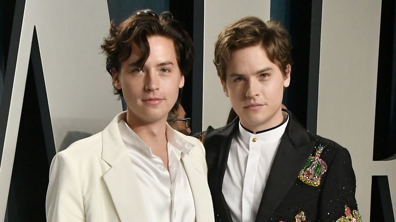 Cole and Dylan Sprouse looking at camera