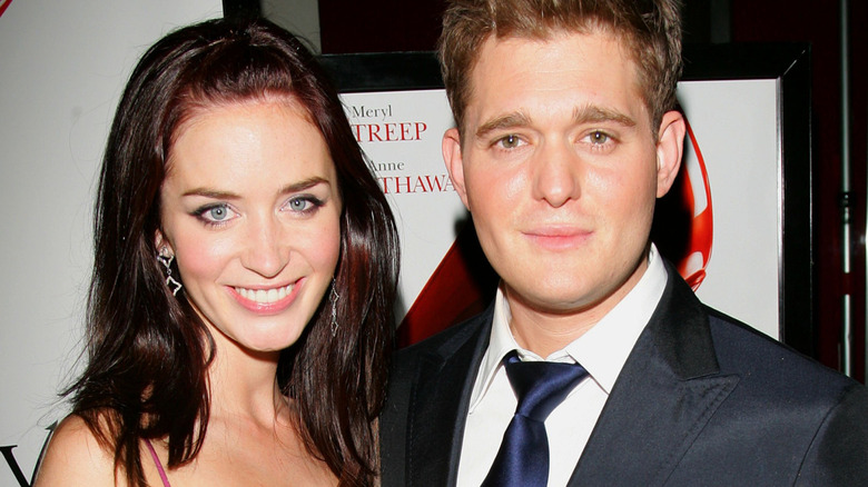 Emily Blunt and Michael Bublé posing