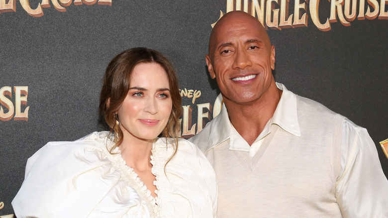 Emily Blunt and Dwayne Johnson smiling
