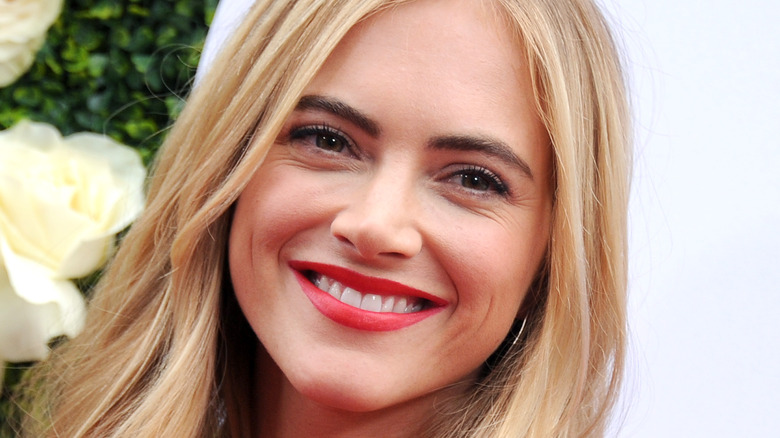 Emily Wickersham smiling for photos