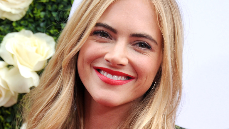 Emily Wickersham smiling for photos