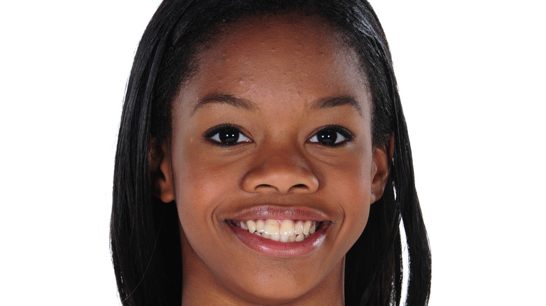 Teenage Gabby Douglas smiling