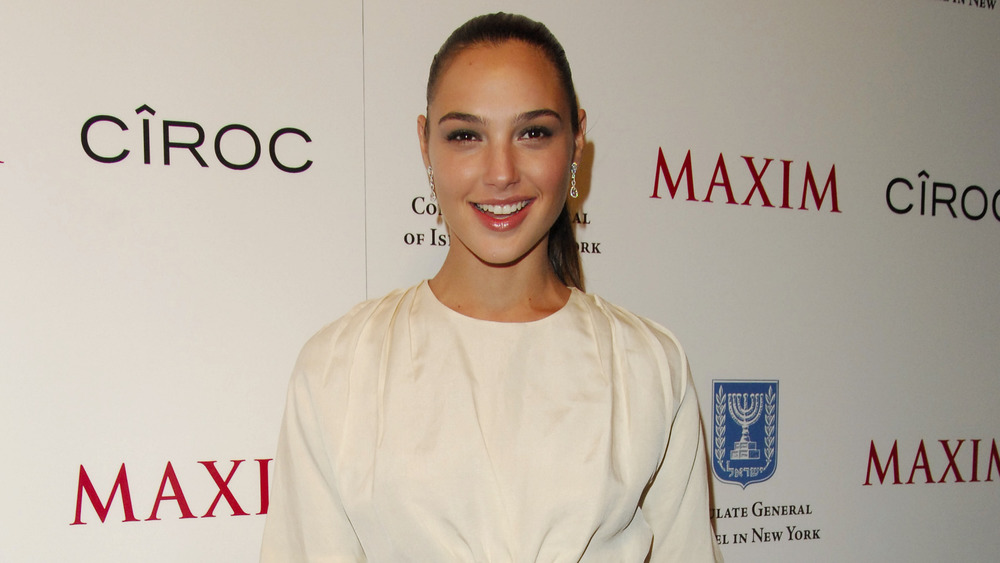 Gal Gadot smiling on the red carpet