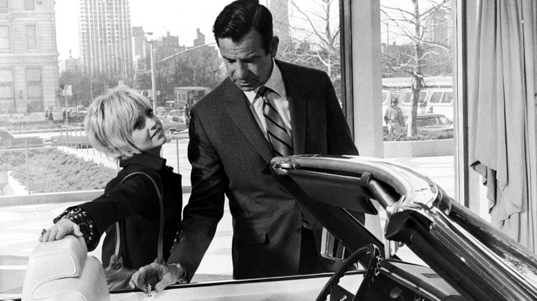 Goldie Hawn with co-star Walter Matthau in a scene from Cactus Flower