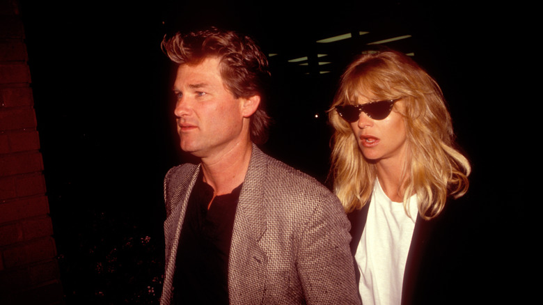 Kurt Russell and Goldie Hawn exiting Spago in 1991