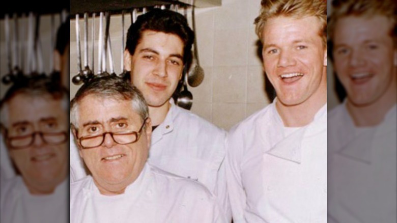 Albert Roux, Thierry Busset, and Gordon Ramsey taking a photo