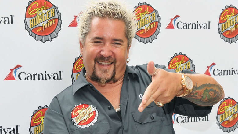 Guy Fieri pointing while posing