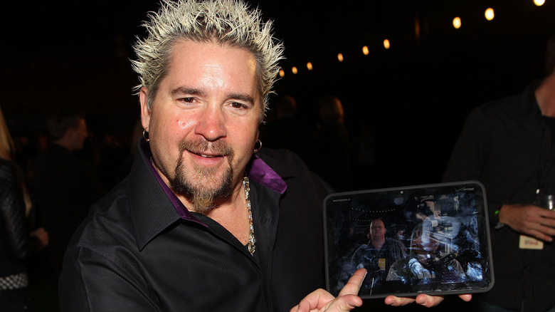 Guy Fieri pointing to an iPad