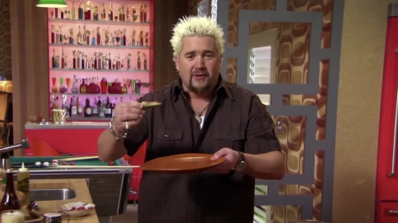 Guy Fieri cooking on TV
