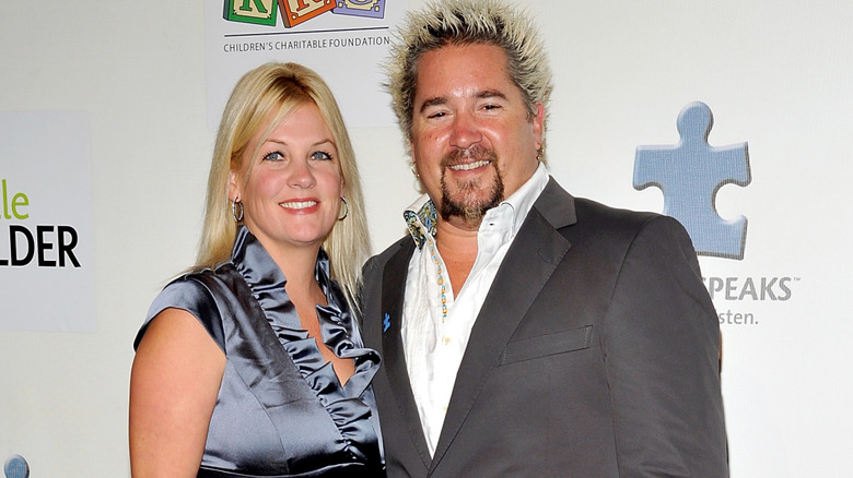 Guy Fieri, wife Lori posing together