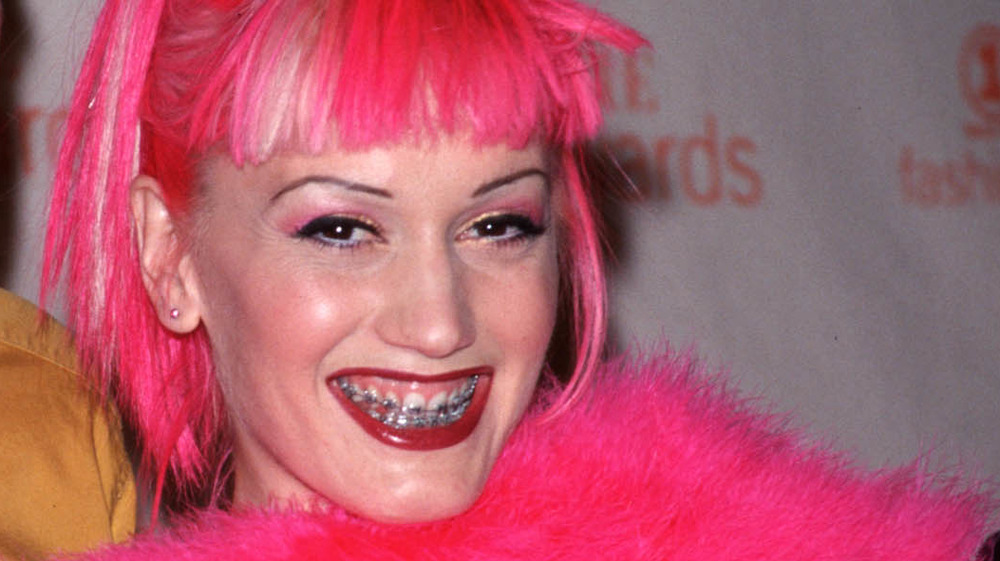 Gwen Stefani with braces and pink hair