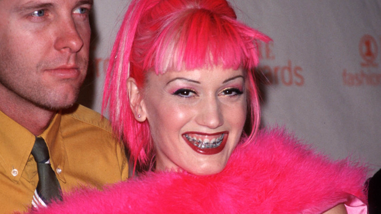 Gwen Stefani with braces and pink hair