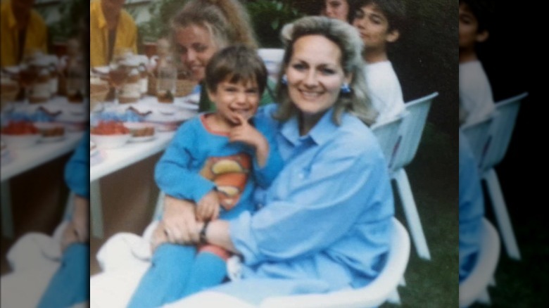 Young Henry Cavill and his mom smiling