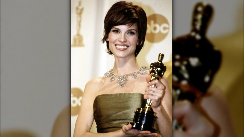 Hilary Swank holding first Oscar