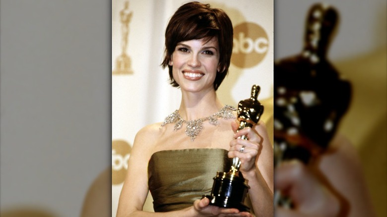 Hilary Swank holding first Oscar