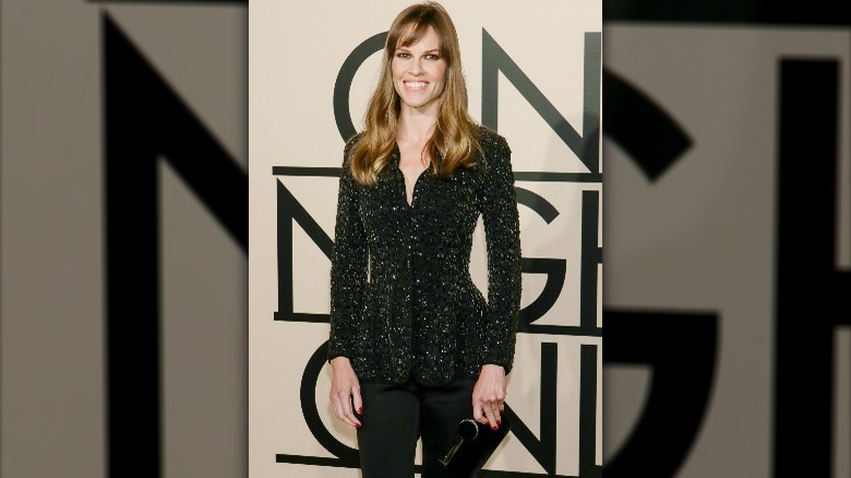 Hilary Swank in black suit