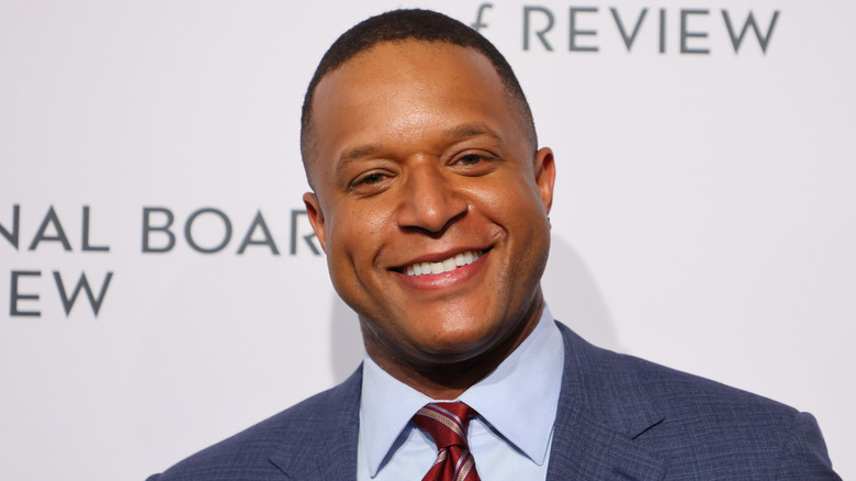 Craig Melvin posing on the red carpet at event held by the National Board of Review