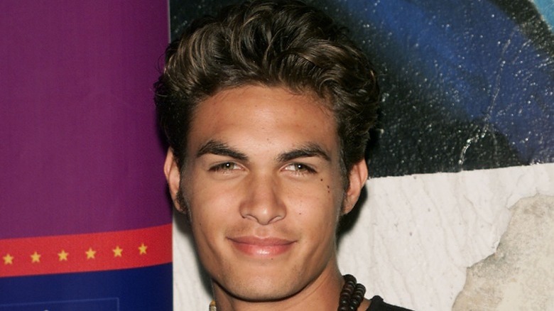 young Jason Momoa smiling
