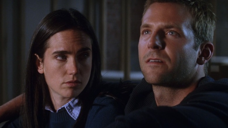 Jennifer Connelly looking at Bradley Cooper