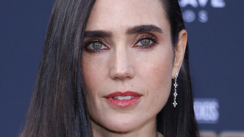 A closeup of Jennifer Connelly, posing
