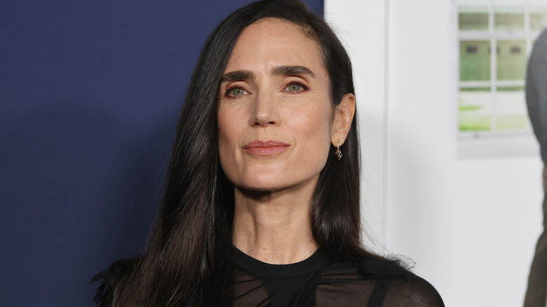 A closeup of Jennifer Connelly, posing