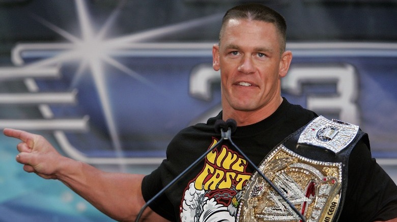 John Cena holding spinner belt