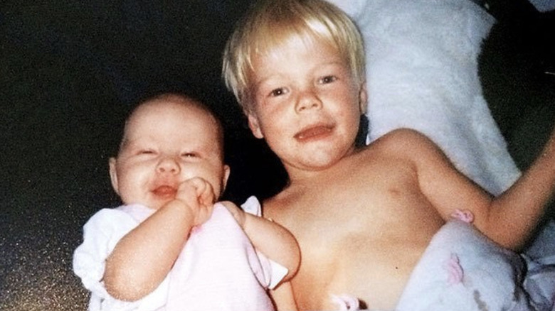 Baby Julianne Hough and Derek Hough smiling