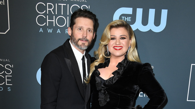 Brandon Blackstock and Kelly Clarkson posing