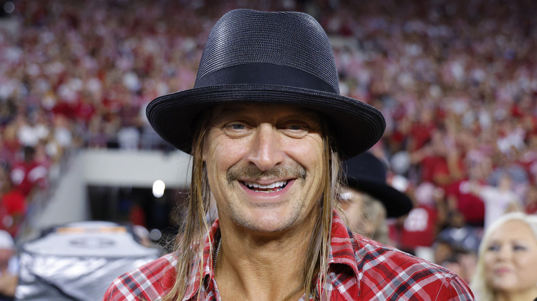 Kid Rock posing in front of a crowd