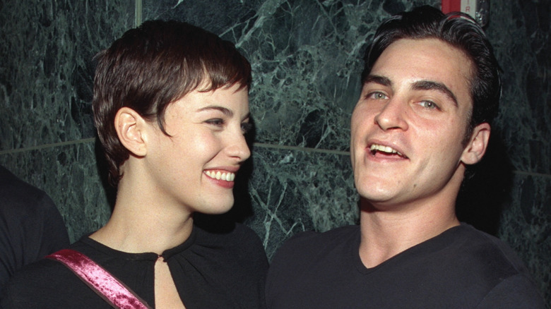 Liv Tyler and Joaquin Phoenix smile
