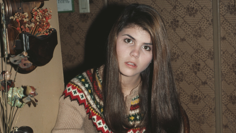 Lori Loughlin posing