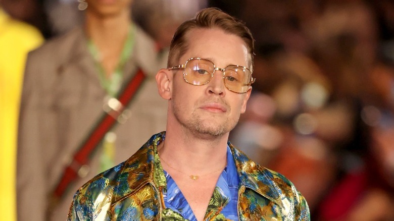 Macaulay Culkin wearing sunglasses