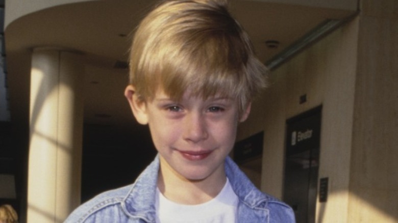 Macaulay Culkin smiling
