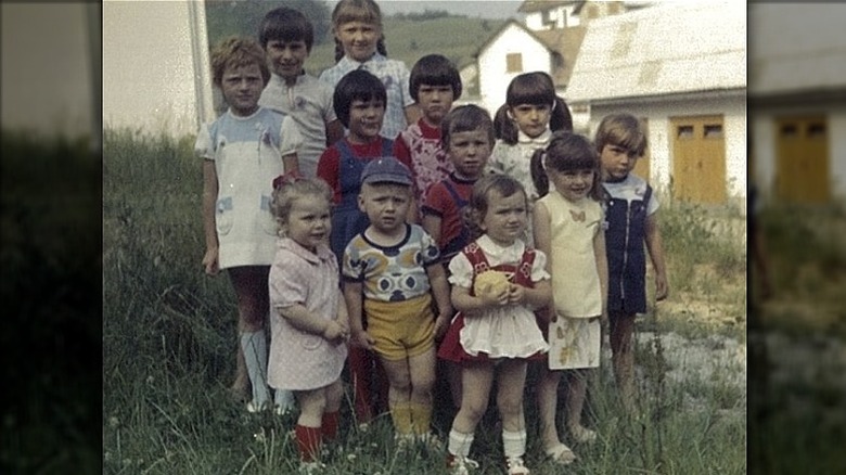 Young Melania Trump with children in Slovenia, second from right