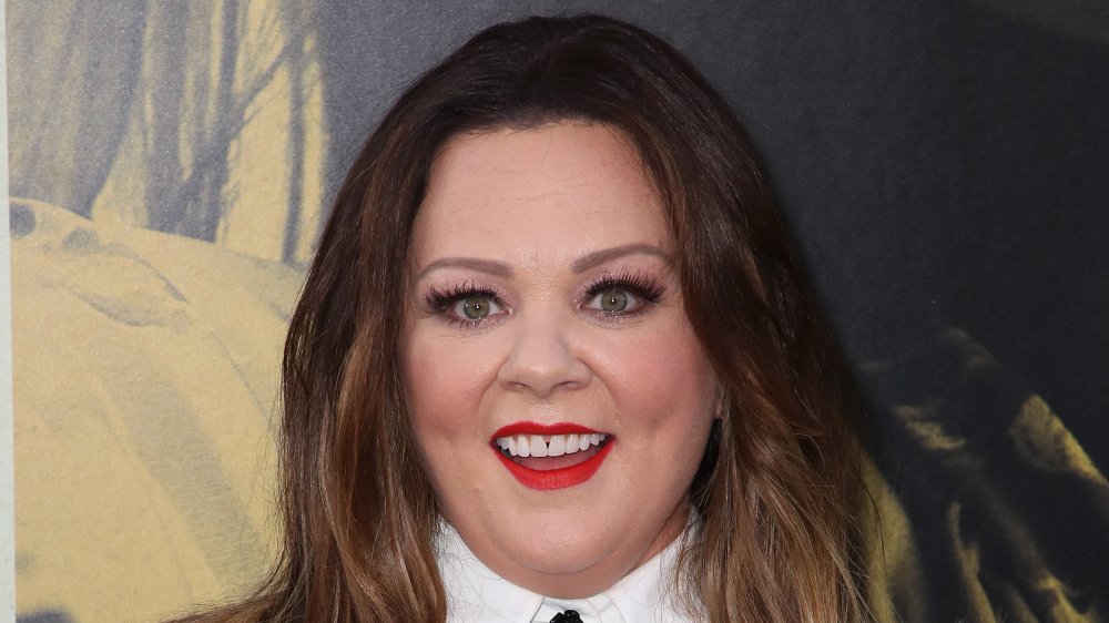 Melissa McCarthy smiling big at a 2019 event