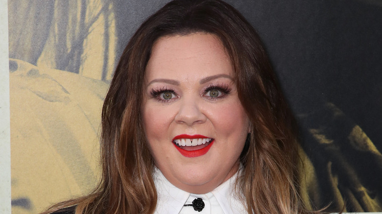 Melissa McCarthy smiling big at a 2019 event