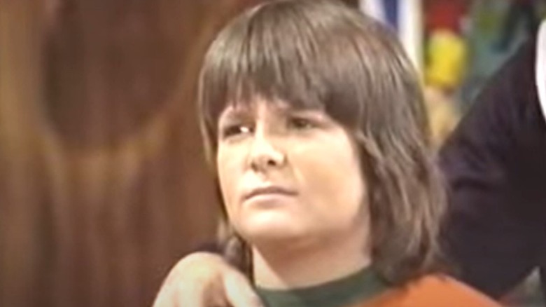 Michael J. Fox with long hair