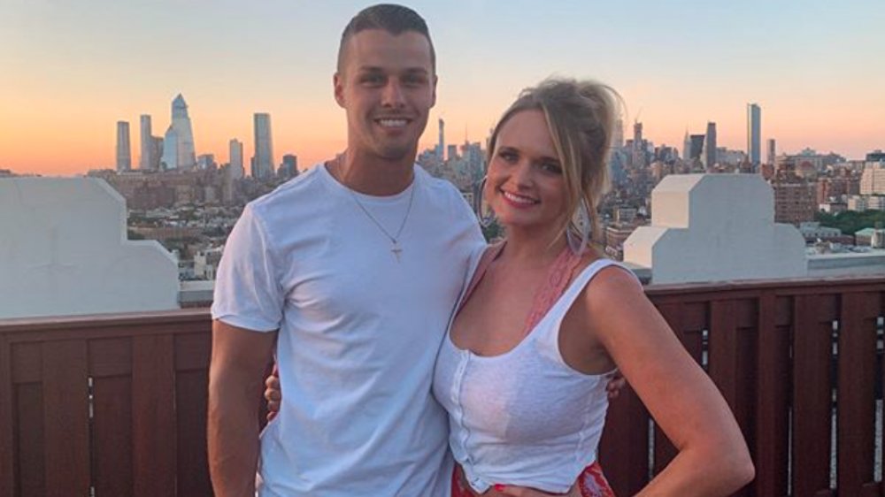 Brendan McLoughlin and Miranda Lambert pose for a rooftop photo on Instagram