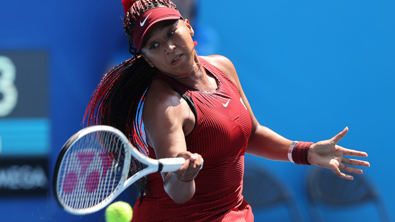 Naomi Osaka playing tennis, 2021 Olympics 
