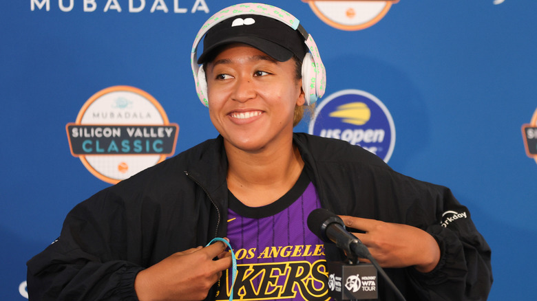 Naomi Osaka wearing a Lakers' jersey