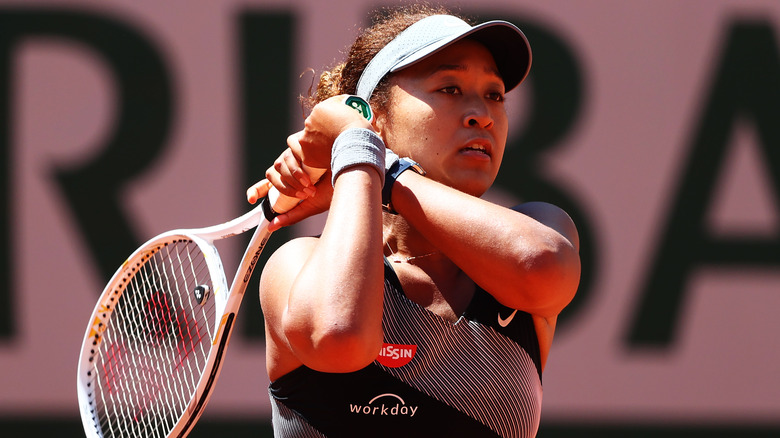 Naomi Osaka looking upset while playing