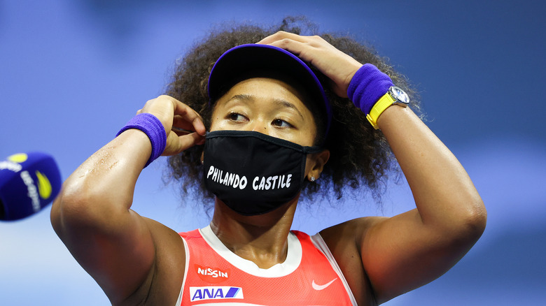 Naomi Osaka wearing BLM mask on tennis court
