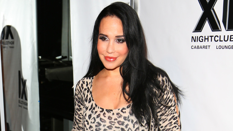 Natalie Suleman posing on a red carpet
